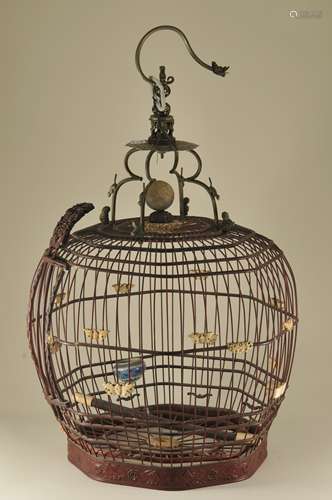 Bird cage. China. 19th century. Wood, bone, porcelain with paktong mounts. 21