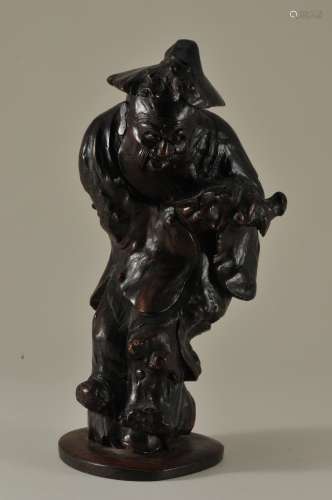 Burlwood carving. China. 19th century. Standing figure of an Immortal. 6-1/2