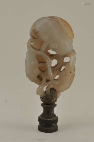 Jade carving. China. 19th century. Grey and russet stone carved as Ling Chih. 2-1/4