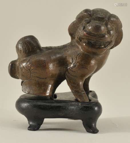 Bronze paperweight. China. 19th century. Cast in the form of a foo dog. 2-1/2