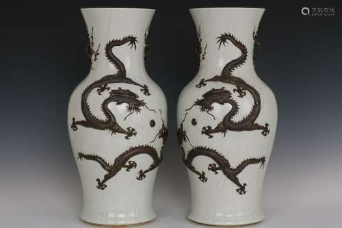 A Rare Pair of White Glaze and Brown Dragon Porcelain Vases