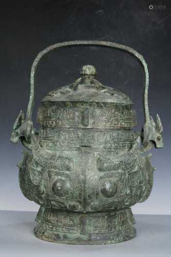 A Bronze Ritual Wine Vessel and Cover