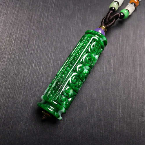 A LONG JADEITE PENDANT OF LOTUS