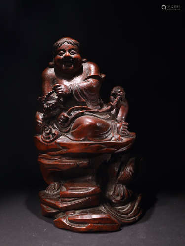 AN OLD BAMBOO BUDDHA FIGURE