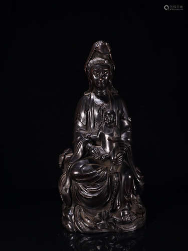 A SMALL ZITAN WOOD BUDDHA FIGURE