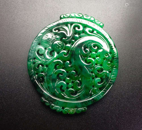 A JADEITE PENDANT WITH DRAGON PATTERN