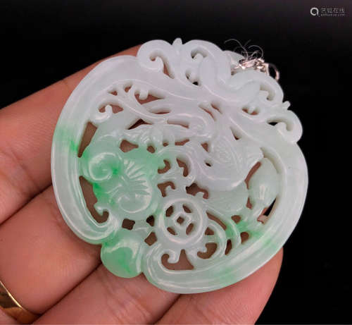 A JADEITE PENDANT OF CRANE SHAPE