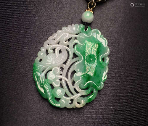 A WAXY JADEITE PENDANT OF LOTUS