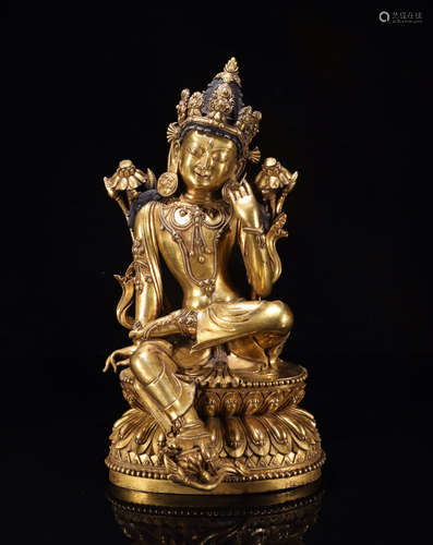 A GILT BRONZE BUDDHA FIGURE