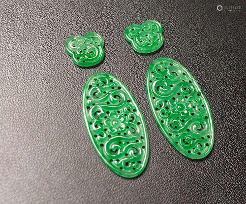 A PAIR OF FLORAL JADEITE PENDANTS