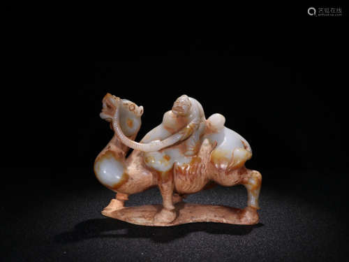 AN OLD JADE ORNAMENT OF CAMEL RIDER