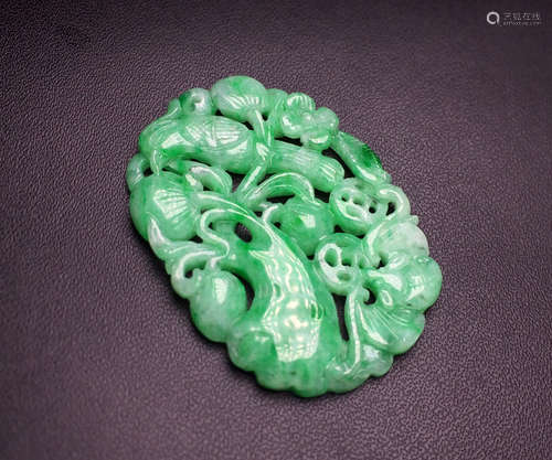 A JADEITE PENDANT OF MAGPIE SHAPE