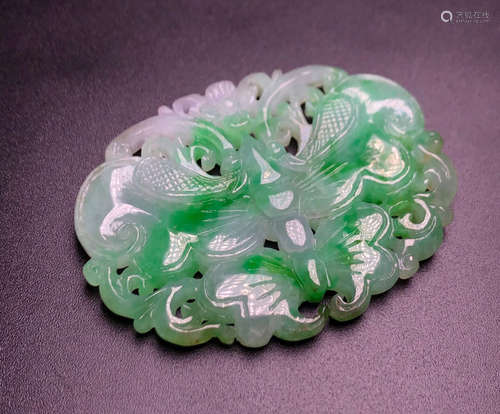 A JADEITE PENDANT WITH BUTTERFLY PATTERN