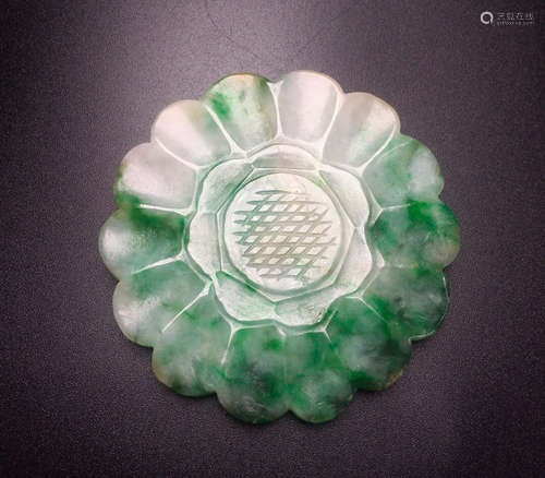 A JADEITE PENDANT SHAPED AS FLOWER