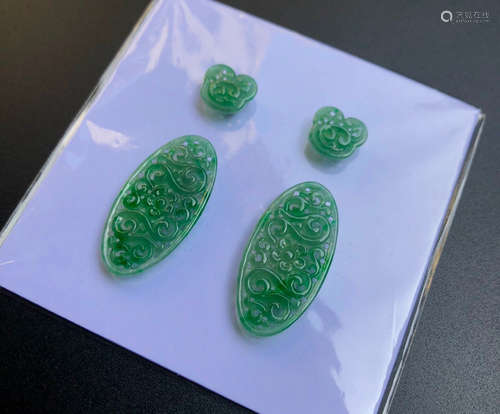 A PAIR OF SMALL JADEITE PENDANTS