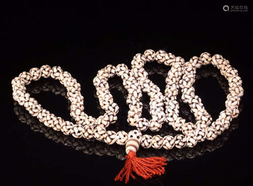 A NECKLAE MADE OF 108 JADE BEADS