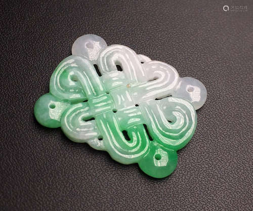 A JADEITE PENDANT OF CLOUD SHAPE