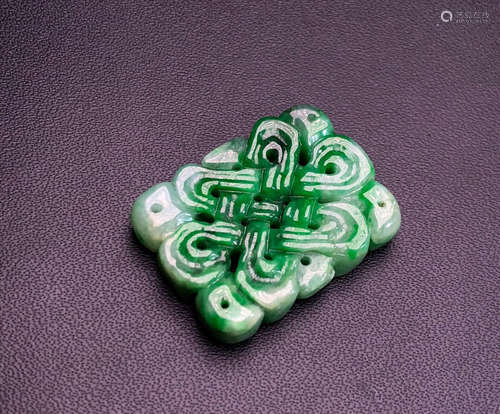 A JADEITE PENDANT OF CLOUD SHAPE