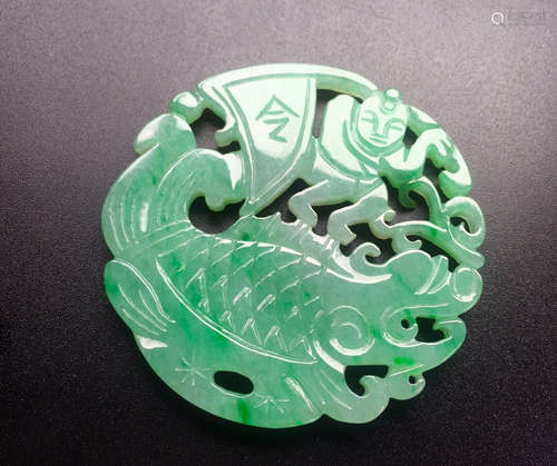 A CIRCLE JADEITE PENDANT WITH CARP PATTERN