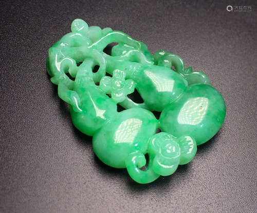 A JADEITE PENDANT OF ICE GOURD SHAPE