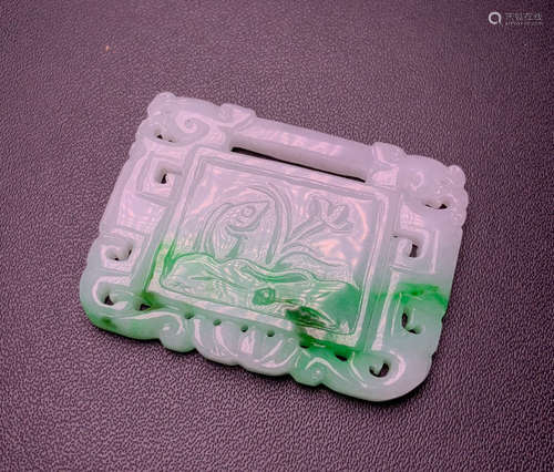 A RECTANGULAR JADEITE PENDANT