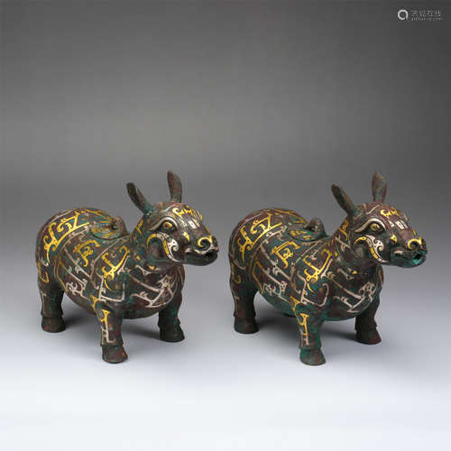 PAIR OF CHINESE GOLE SILVER INLAID BRONZE BEASTS