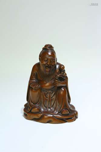 A Chinese Carved Wood Figure