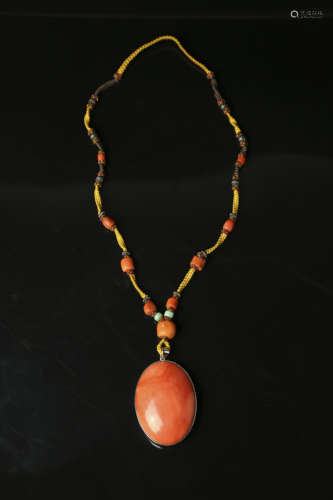 A Chinese Carved Coral Necklace