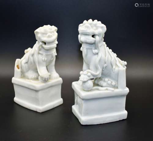 A pair of Chinese blanc-de-chine food dogs- 18th century