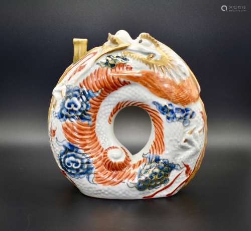 A fine and rare Japanese Hirado ware sake bottle in the form of a coiled dragon- 19th century