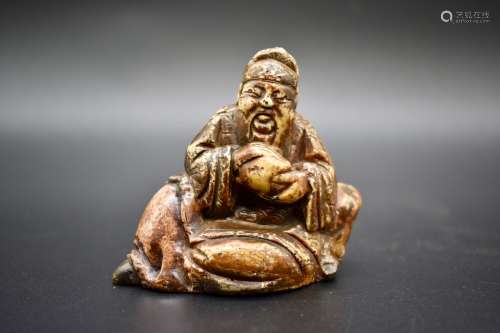 A Chinese soap stone figure of a scholar- 19th century