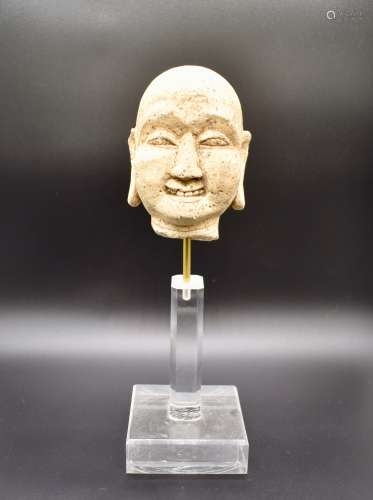 A fine Chinese sculpture of a fragment of a Buddhist Monk- Tang dyanty or later. 8th century or later.