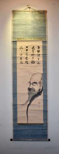 A Japanese zen painting scroll of a Daruma.