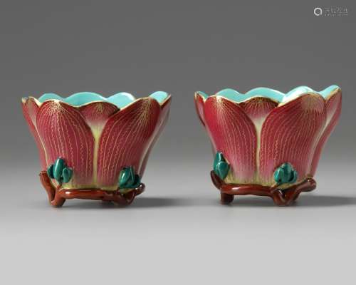 A pair of Chinese famille rose 'lotus' cups