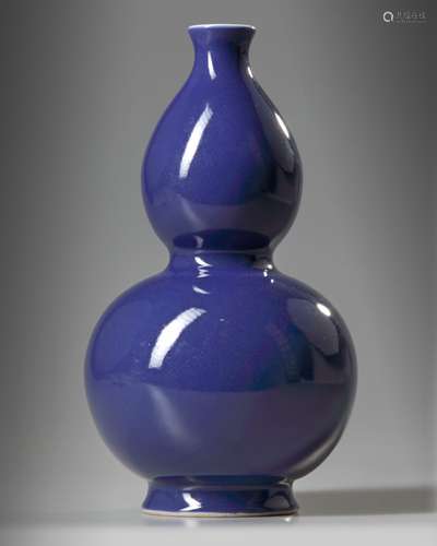 A Chinese blue-glazed double gourd vase