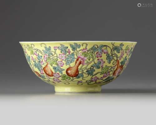 A Chinese yellow-ground famille rose 'gourds' bowl