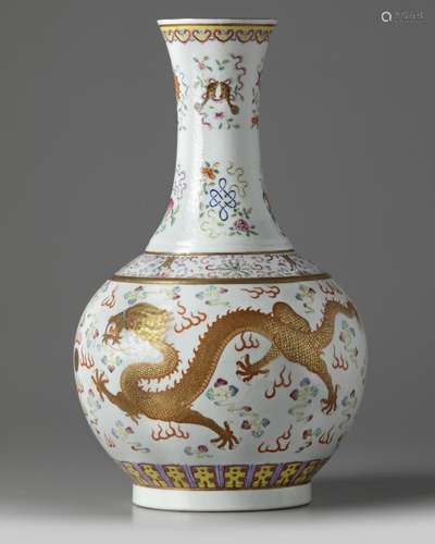 A Chinese famille rose 'dragon' bottle vase