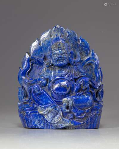 A Chinese lapis lazuli figure of Jambhala.