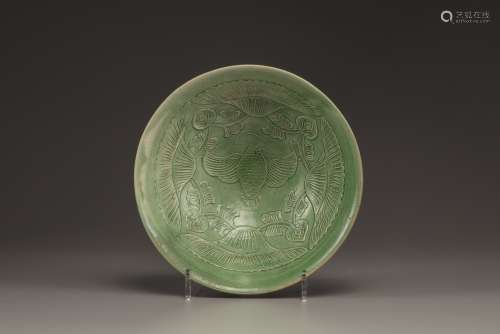 A Yaozhou carved green glazed conical bowl