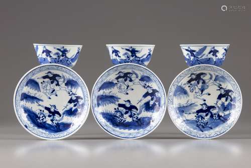 Three Chinese blue and white warriors cups and saucers