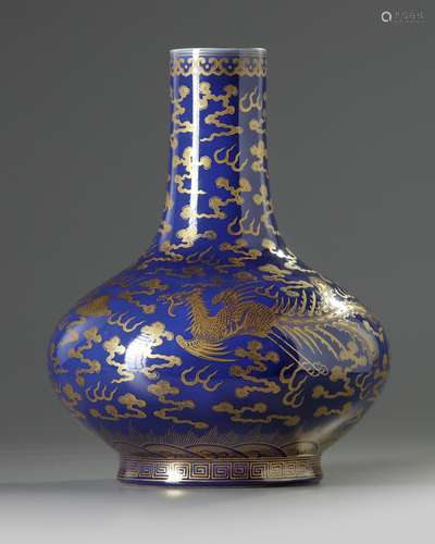 A Chinese blue-ground gilt-decorated 'dragon and phoenix' bottle vase