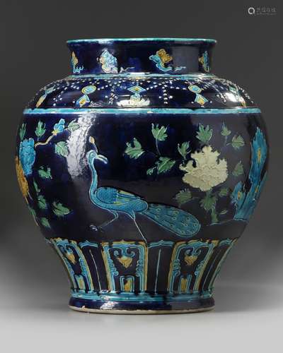 A Chinese blue-ground fahua wine jar