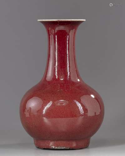 A Chinese red glazed bottle vase