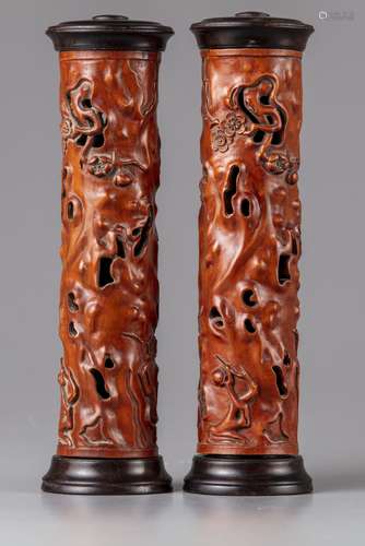 A pair of Chinese carved bamboo incense holders