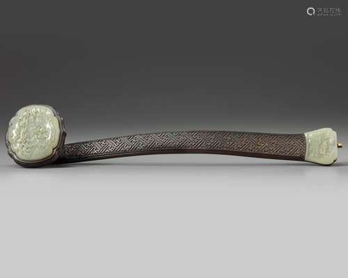 A jade-inset wooden ruyi sceptre