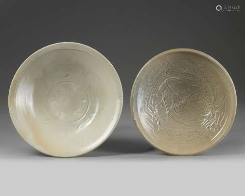 Two Chinese celadon-glazed carved bowls