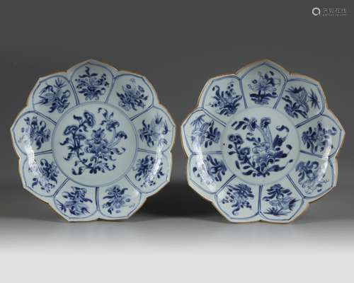 A pair of Chinese blue and white lotus-shaped dishes