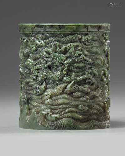 A carved spinach green jade brush pot