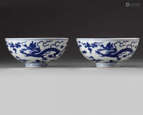 A pair of Chinese blue and white 'dragon' bowls