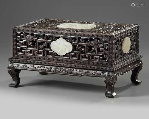 A Chinese white jade-inlaid carved box and cover